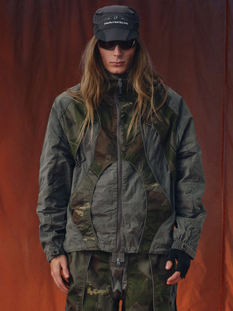 PF / Silent-Runner‘s Hydro-Reactive Modular Camo Jacket
